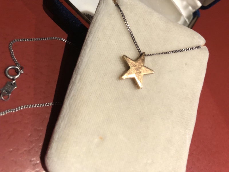 9 Ct star pendant on a sterling silver chain . Carousel 7