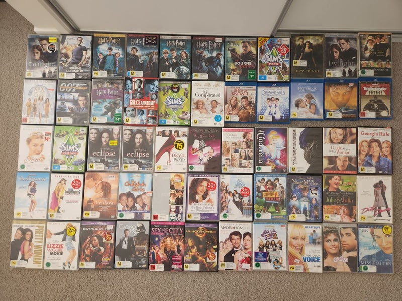 Bulk Assorted DVD's, Blu-ray, and PC games Carousel 2