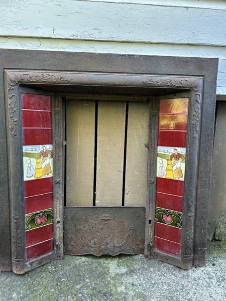Cast iron fireplace surround Carousel 1
