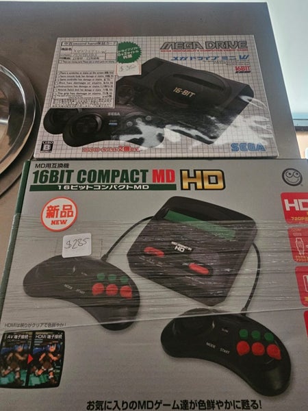 2 consoles. 2 carliges.Sega mega drive mini and 16 bit compactor Carousel 2