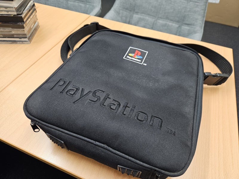 Playstation 1 + Controllers + Games + Carry Bag Carousel 2