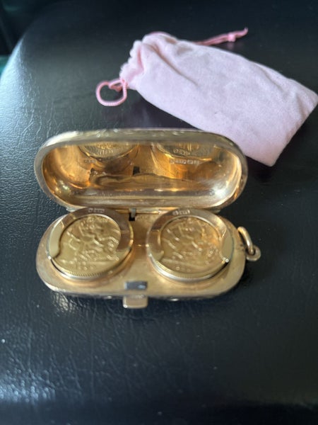 Gold sovereign case holder and sovereigns Carousel 2