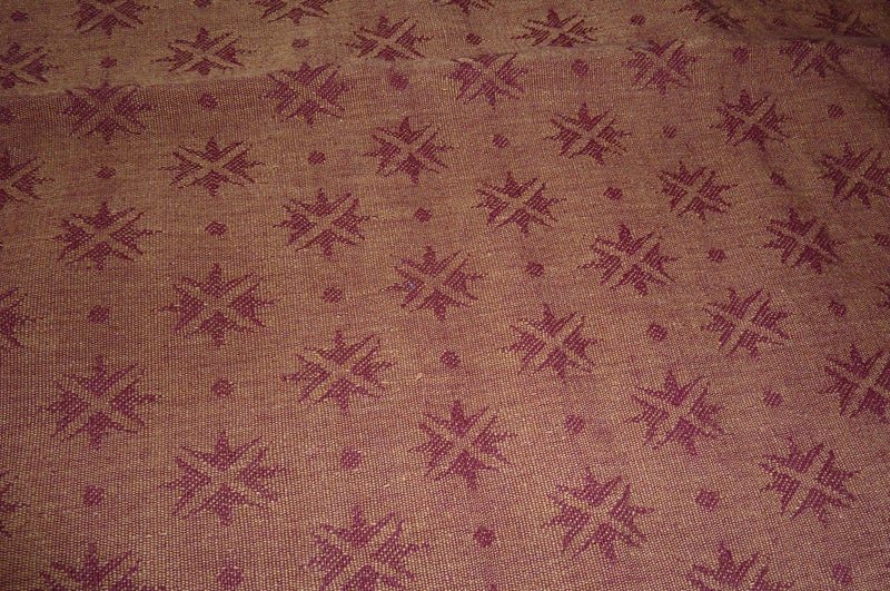 A piece of heavyweight dark burgundy upholstry fabric Carousel 1