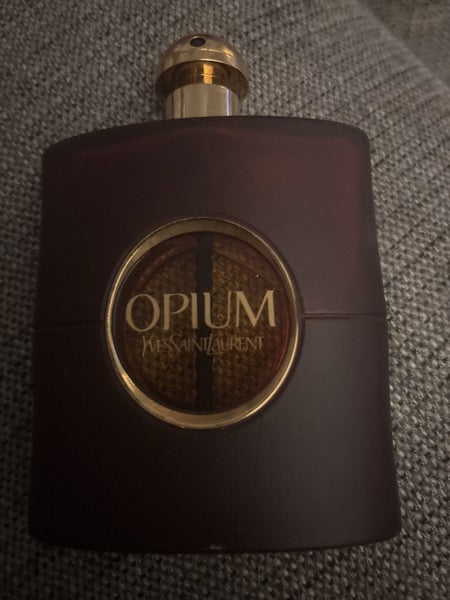 YSL Opium Carousel 1