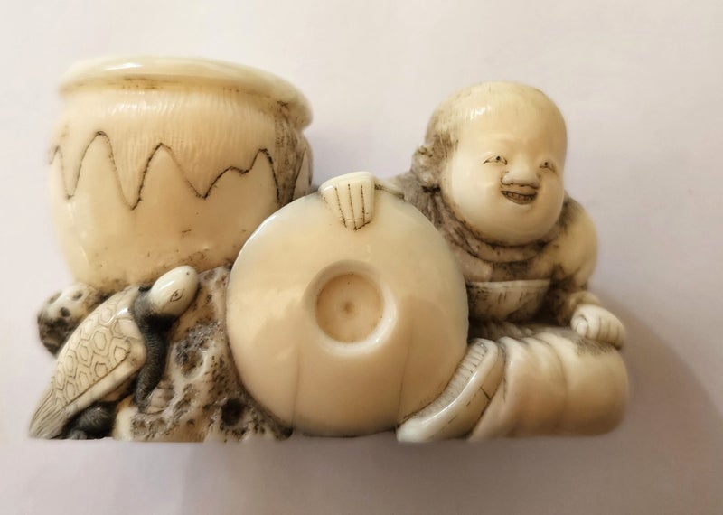NETSUKE Carousel 1