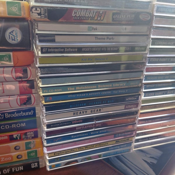 Lot of 50 PC DVD CD ROM GAMES INC. RARE (Myst, Sims, Kid Pix, Unreal, Carmen) Carousel 2