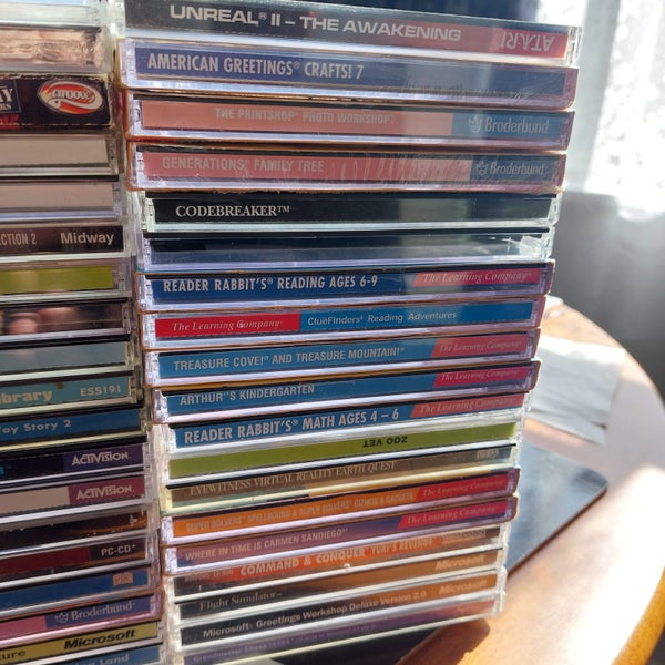 Lot of 50 PC DVD CD ROM GAMES INC. RARE (Myst, Sims, Kid Pix, Unreal, Carmen) Carousel 3