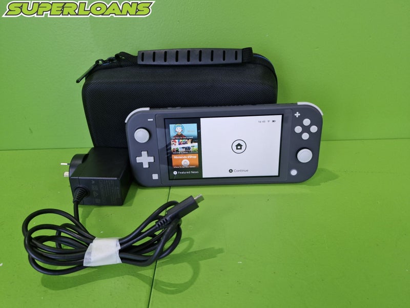 ** NINTENDO SWITCH LITE + CHARGER + CASE ** Carousel 1