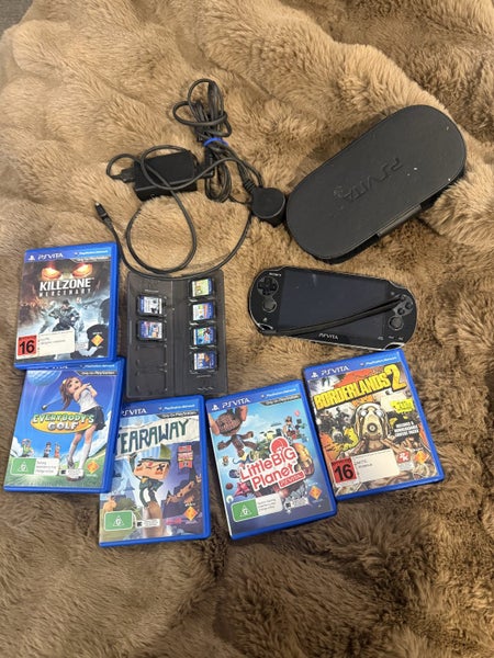 Ps vita bundle *case, charger, 11 games!! Carousel 1
