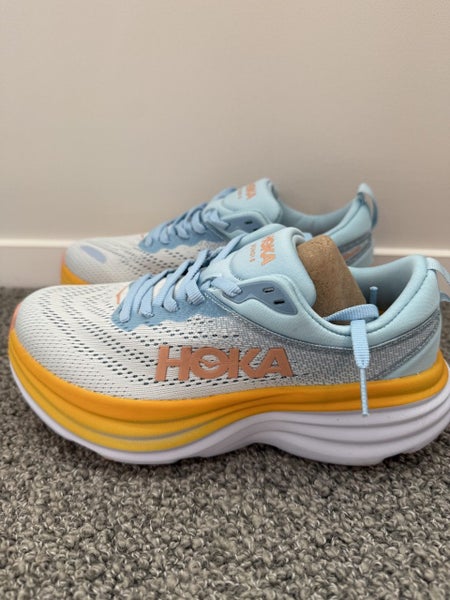 Hoka Bondi 8 Sneakers in White with Blue and Orange EUR 38 Carousel 1