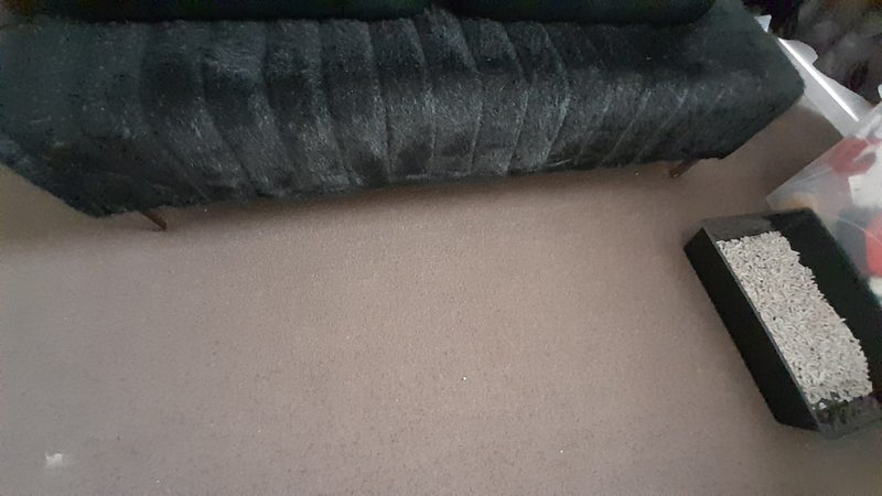 Gorgeous large black fake fur fabric ottoman with chrome feet. Carousel 1