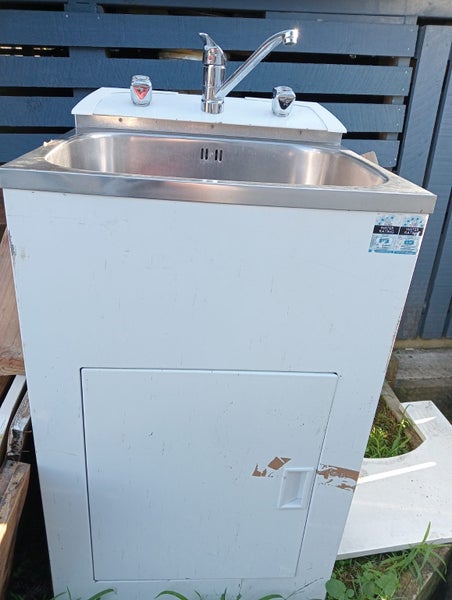 Laundry Tub and Cabinet Carousel 1