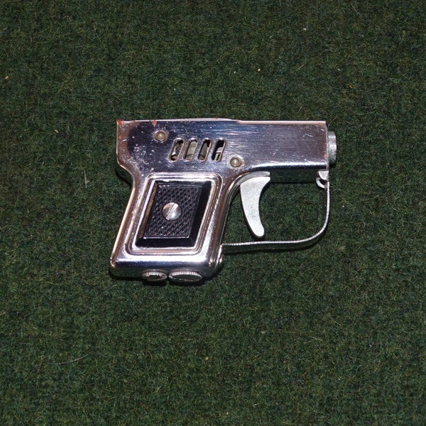 Small Partner Pistol/Lighter .......... Made in Japan ? Carousel 1