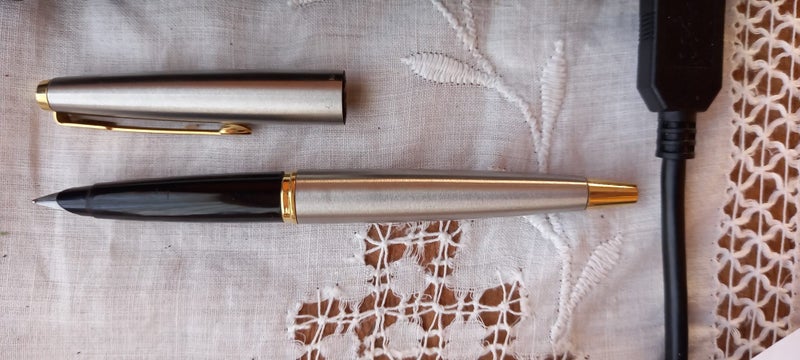 Vintage 1940's-50's Parker 45 Fountain Pen. Chrome Metal both ends. Carousel 1