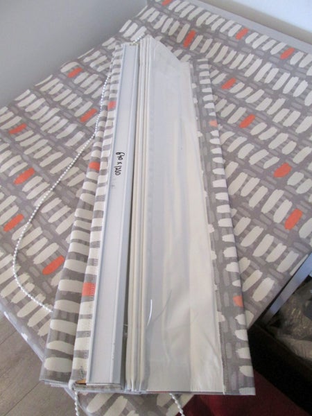 Two Patterned Roman Blinds Carousel 2