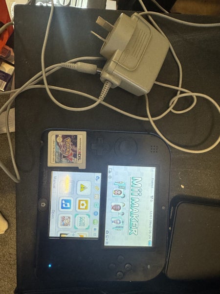 Nintendo 2DS + Pokemon Y Carousel 1