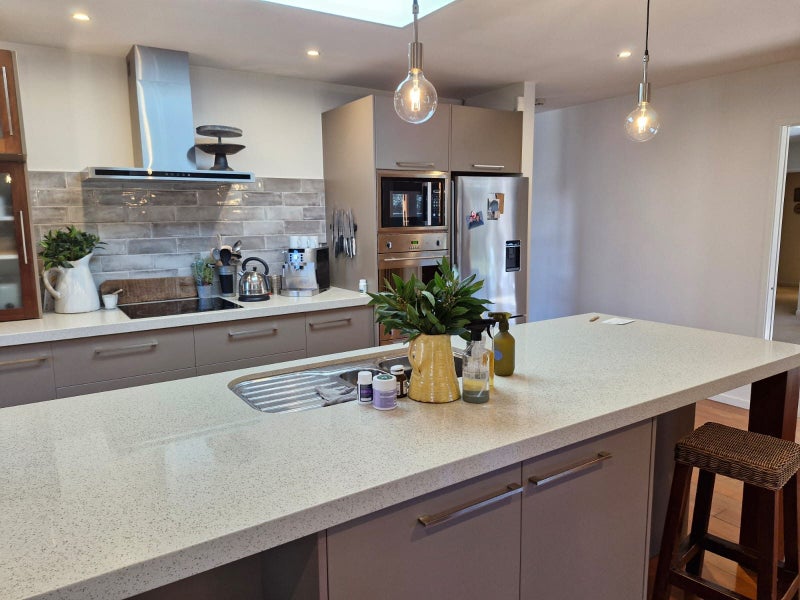 Kitchen, Meltecca cabinets with Ceaserstone tops with oven Carousel 1