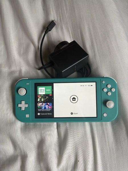 Nintendo Switch Lite - Turquoise Carousel 1
