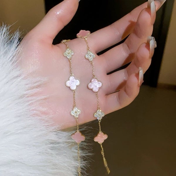 Four-Leaf pink Clover-Inspired Charm Bracelet in Gold Tone Carousel 2