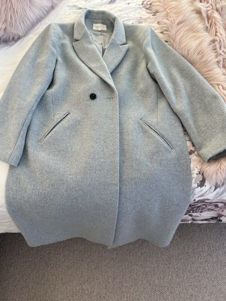 Light blue coat Carousel 2