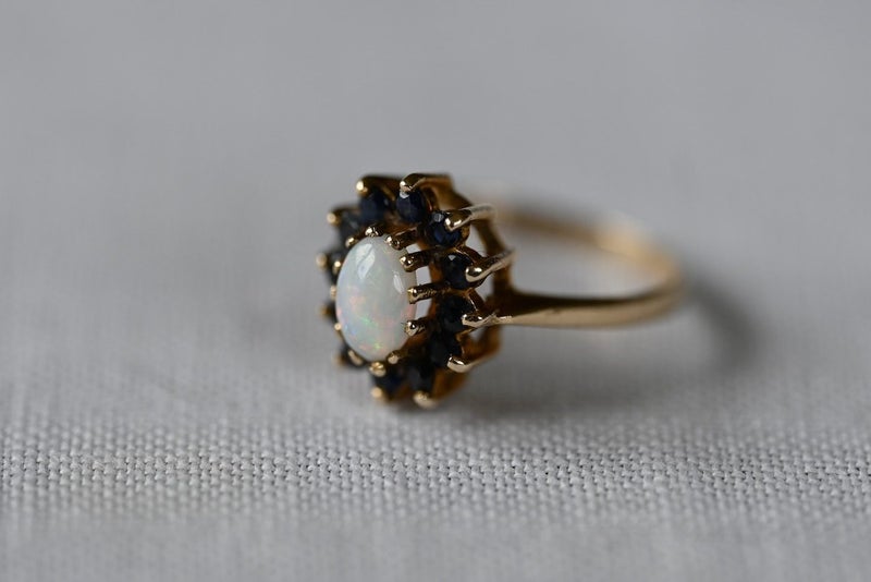 A Vintage 9 Carat Gold Opal & Sapphire Oval Cluster Ring (1973) Carousel 2