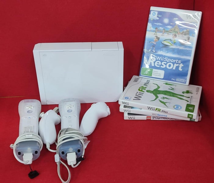 Wii Console + 2 Wiimotes + Wiifit Board + 4 Games Carousel 1