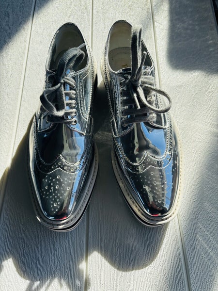Prada Metallic Silver Leather Wingtip Brogue platform sneakers for women Carousel 1