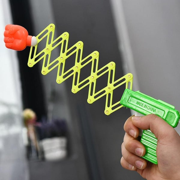 Kids Retractable Elastic Fist Shooter G un Telescopic Trick Gag' Novelty L2P0 Carousel 1
