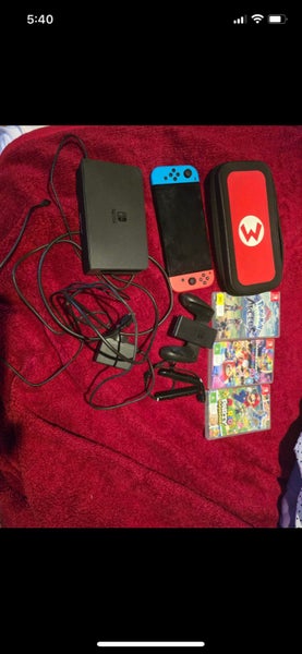 Nintendo Switch OLED plus 3 games Carousel 1