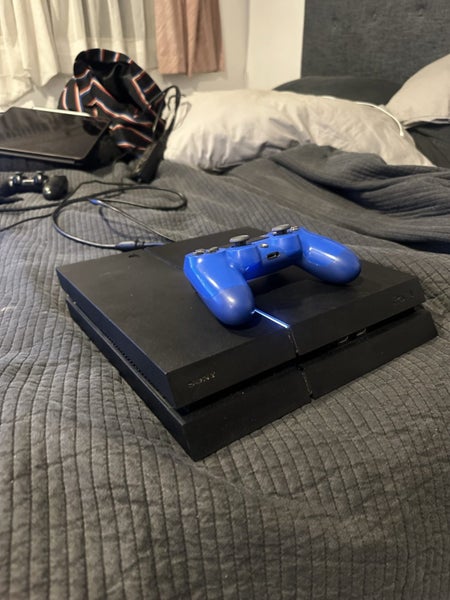 PS4 with a controller Carousel 1