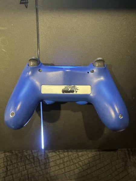 PS4 with a controller Carousel 4