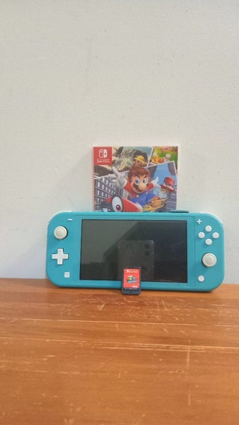 Nintendo Switch Lite + Mario Odyssey Carousel 1