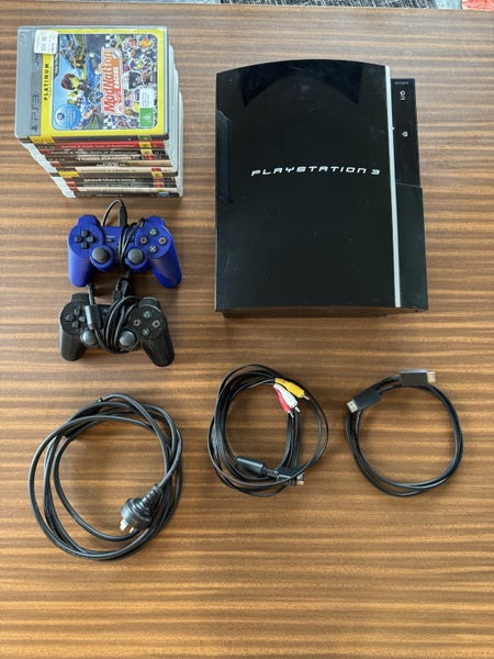 PlayStation 3 + 2 controllers + 11 games Carousel 1