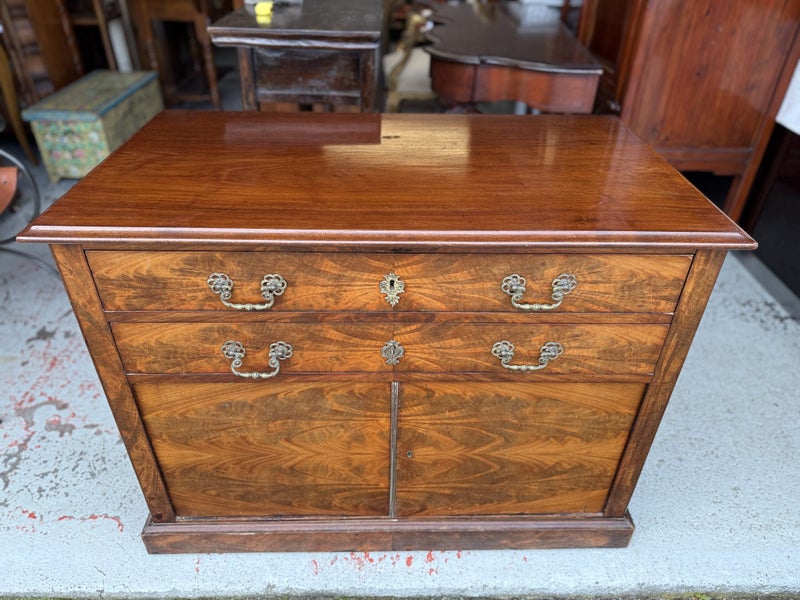 An Antique Flamed Mahogany Cabinet with 2 Drawers Carousel 1