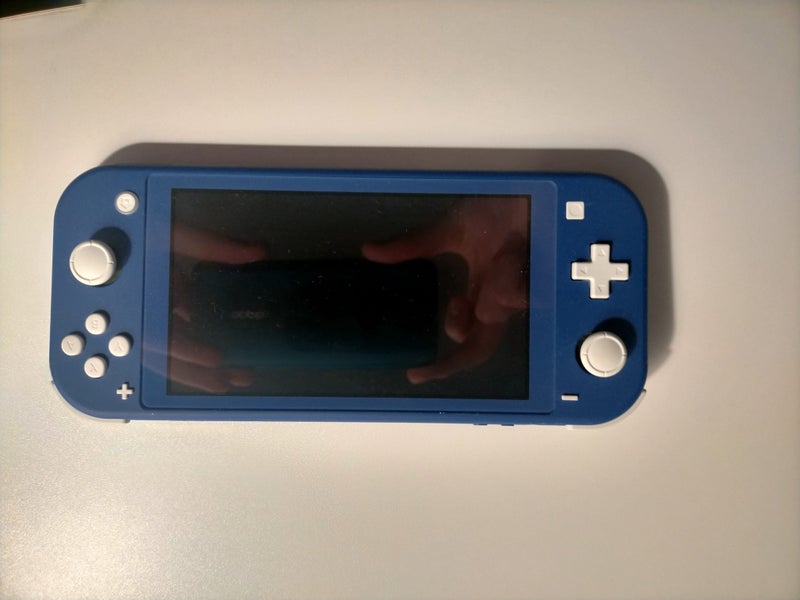 Nintendo Switch Lite Console (Blue, Barely used) + two games Carousel 2