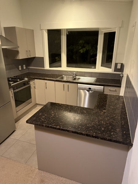 Kitchen - bench top cupboards oven sink Carousel 1