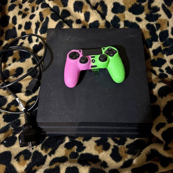ps4 pro 1tb and controller Carousel 1