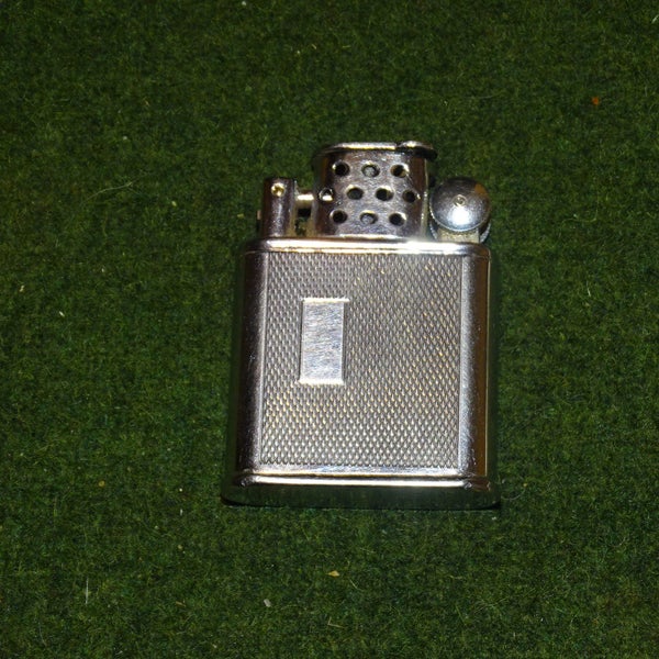 Vintage Orlik Sport Cigarette Lighter ......... Made in London Carousel 2