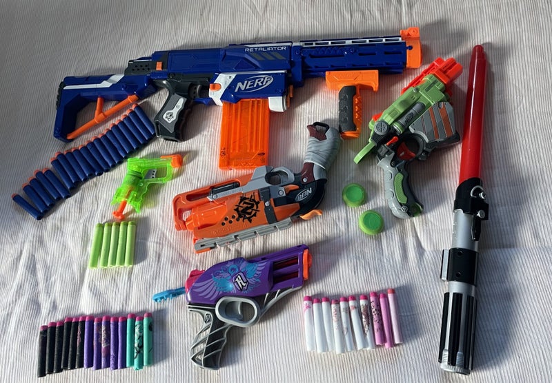 Nerf Guns & light Sabre Carousel 1