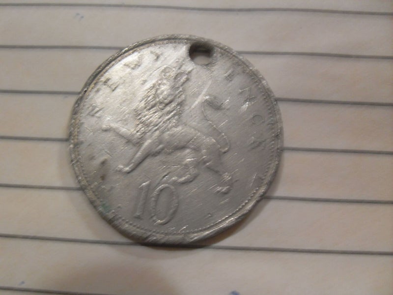 10 New Pence with Hole for chain - rough Carousel 1
