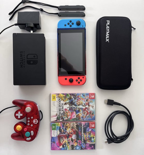 Nintendo Switch Bundle – Games + Controller + Case Carousel 1