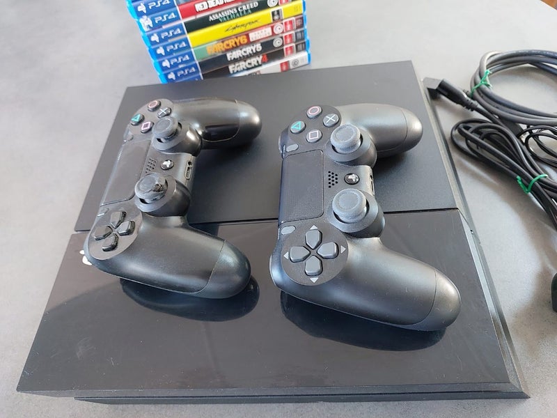 PlayStation 4 with Games Carousel 2