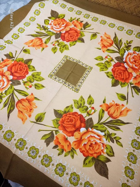 Gorgeous retro orange floral table cloth. Carousel 1