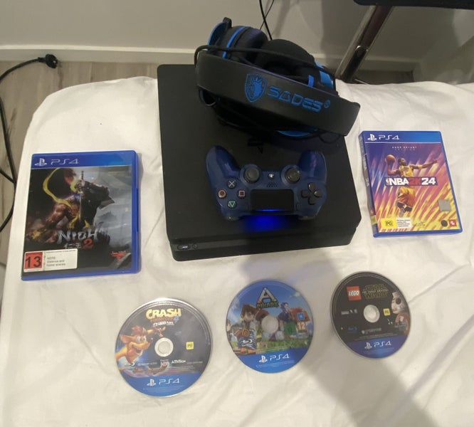 PlayStation 4 Slim 500GB + Controller + Headset + 5 Games Bundle ?? Carousel 1
