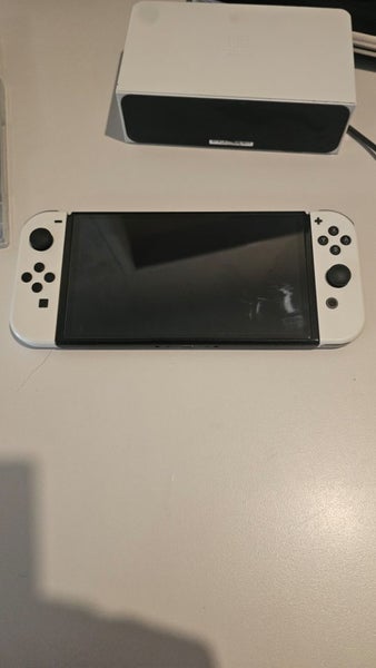 Nintendo Switch OLED + Games Carousel 2