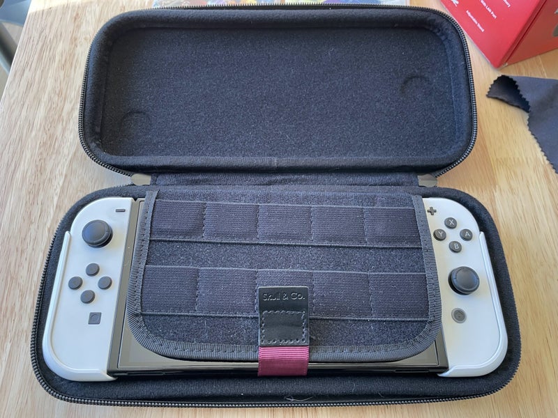 Nintendo Switch OLED - Super bundle with games, a grip, and other cool stuff! Carousel 10