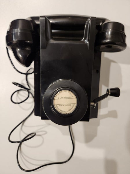 Old 'Seven Sharp' phone wall mounted Carousel 1