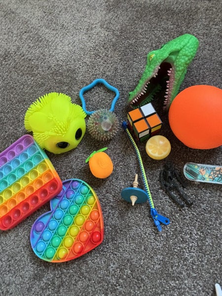 Fidget toys bulk listing carrot needoh popits squishy toys Rubix cube and more! Carousel 1