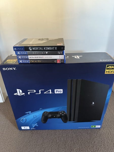Ps4 pro console 2x controllers + games Carousel 1