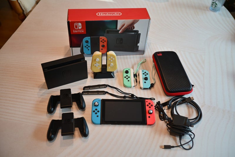 $1 Reserve Nintendo Switch with many accessories Carousel 1